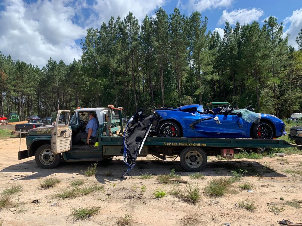 Wrecked C8 Corvette on Chevy C50 Flatbed