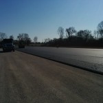 Workers Lay Asphalt for new Corvette Museum Motorsports Park