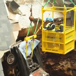 Team Shows Extreme Care in Pulling Corvettes from Sinkhole