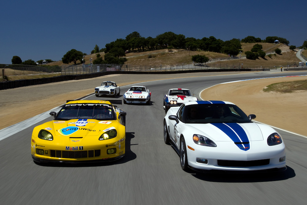 Corvette Racing, American Le Mans Series, Laguna Seca, April 20, 2010, Corvette celebrates 50 years at Le Mans, 2010 #4 C6.R GT2, 2011 VIN 001 GM Design Special Anniversary Z06, 1960 #2 Le Mans competitor, 1969 #49 Le Mans competitor (raced at Le Mans in 1973), and 1967 #9 Le Mans competitor (Richard Prince/GM Racing Photo).