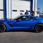 A Blue and Black (Not White and Gold) Corvette Z06 that Complements The Dress