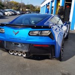 A Blue and Black (Not White and Gold) Corvette Z06 that Complements The Dress