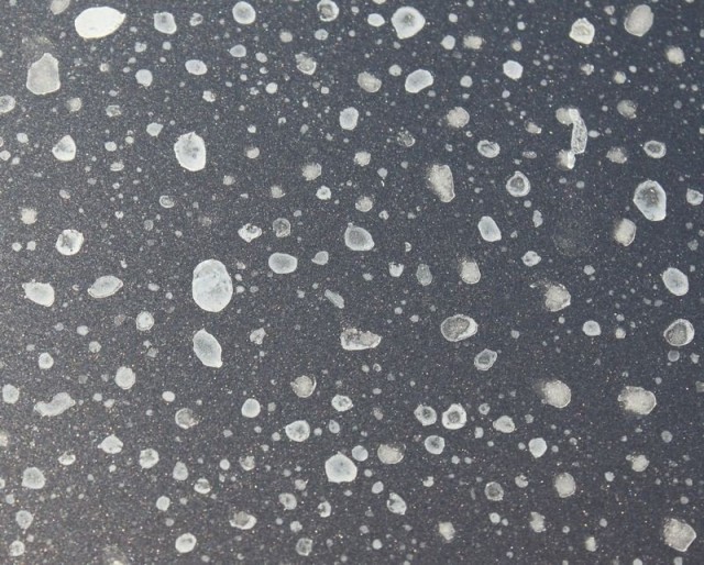 water spots on black paint