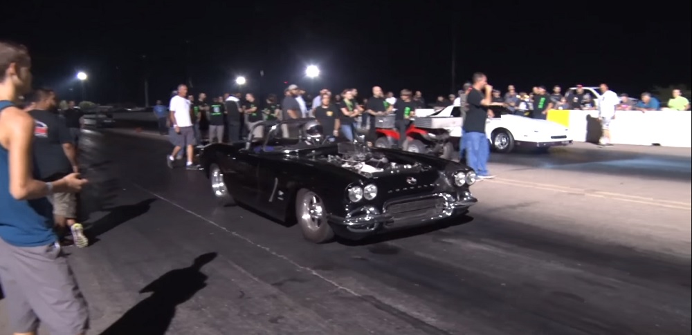 C1 Corvette tearing up the drag strip.